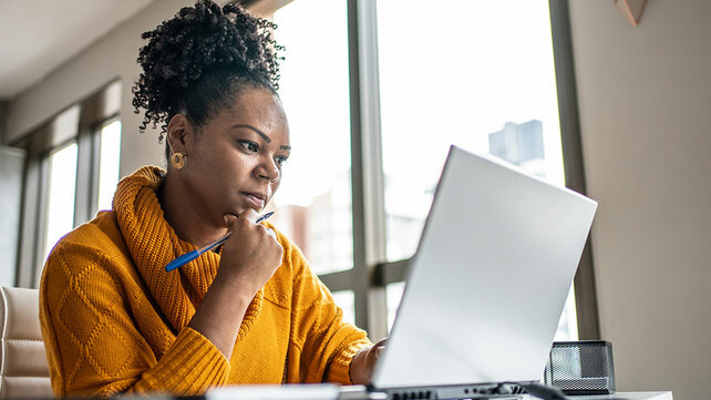Women looking at computer screen