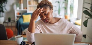 Women stressed at computer